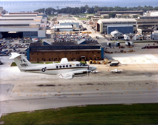 UC-12B_Huron_over_NAS_Jacksonville_1986.JPG
