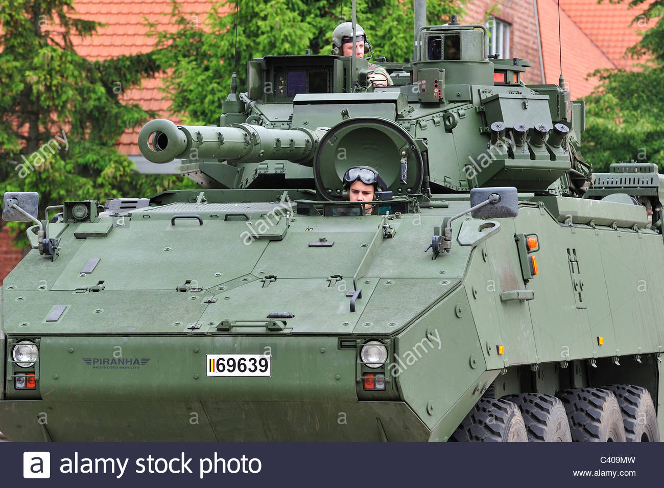 driver-and-commander-in-turret-of-mowag-piranha-iiic-armoured-fighting-C409MW.jpg