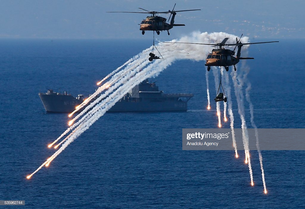 combat-helicopters-are-in-action-during-the-efes2016-combined-joint-picture-id535962744