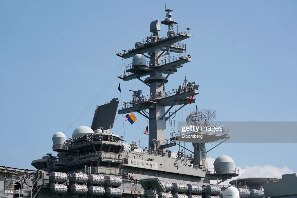 the-uss-ronald-reagan-a-nimitzclass-aircraft-carrier-and-part-of-the-picture-id1064017214