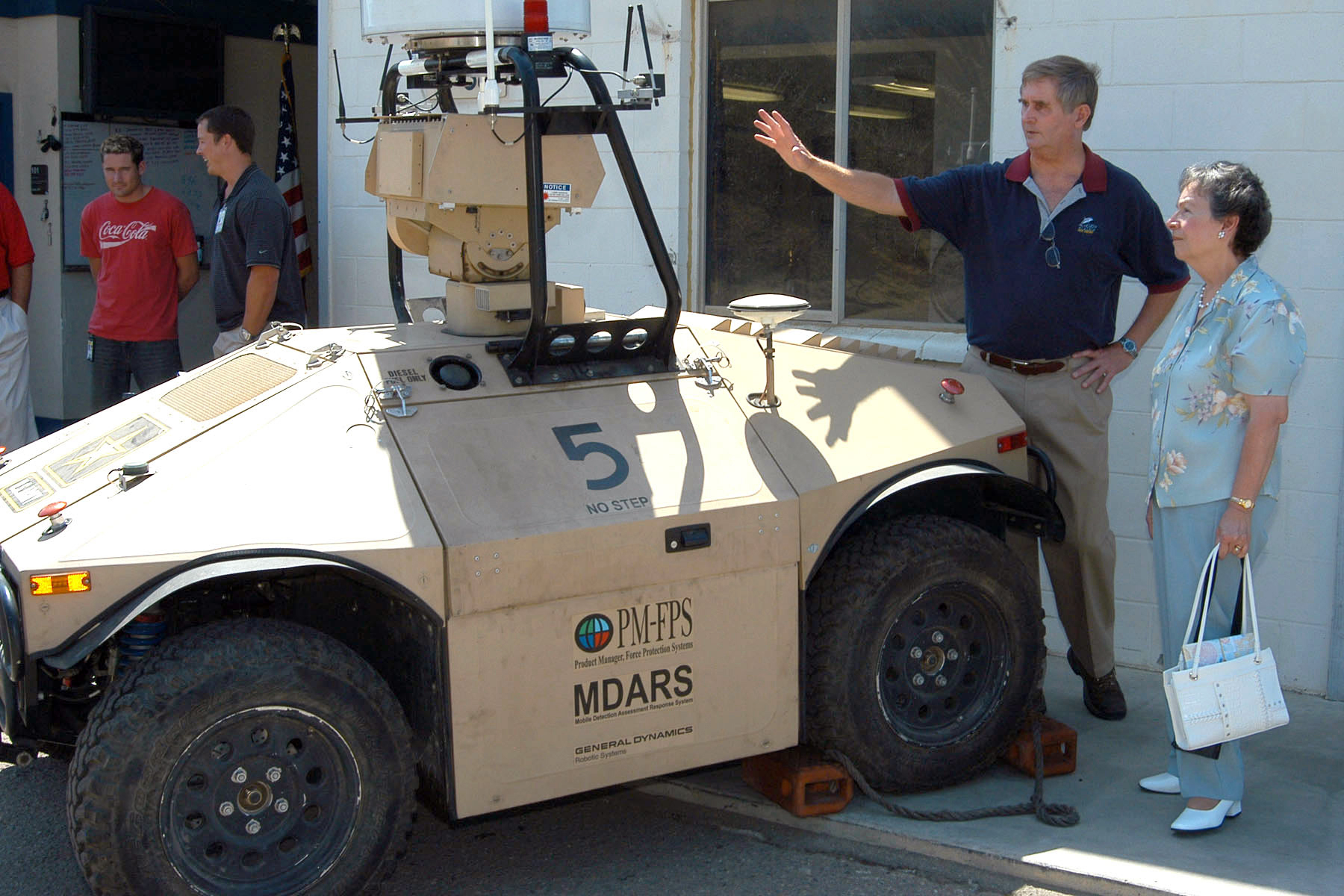 US_Navy_070904-N-1111M-001_Robotics_engineer_Bart_Everett_explains_the_Mobile_Detection_Assessment_and_Response_System_%28MDARS%29_to_Judy_Merry%2C_widow_of_World_War_II_robotics_pioneer_Robert_Merry%2C_at_Space_and_Naval_Warfare_Syste.jpg