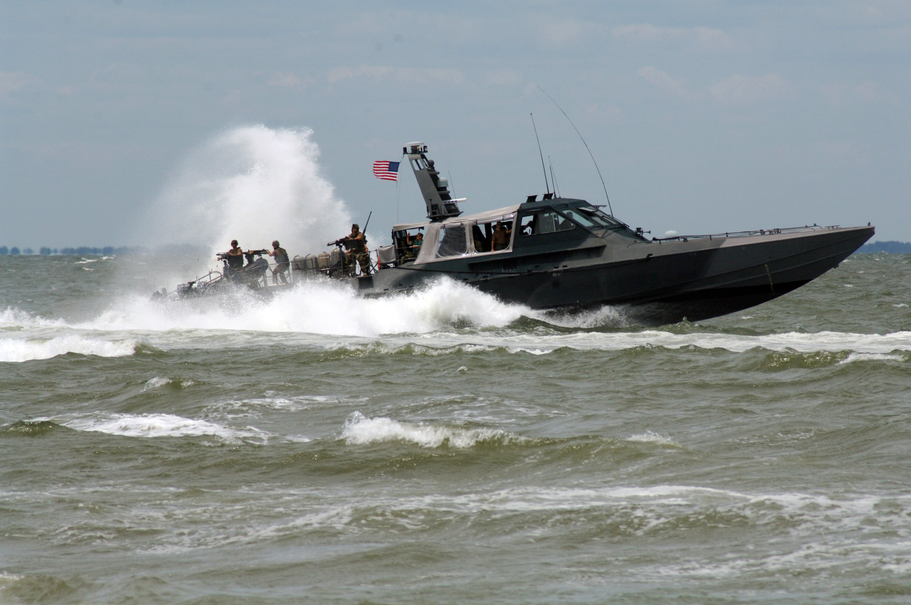 US_Navy_070721-N-5606H-002_A_MK_V_special_operations_craft_provides_cover_fire_during_the_annual_East_Coast_SEAL_reunion_capabilities_demonstration.jpg